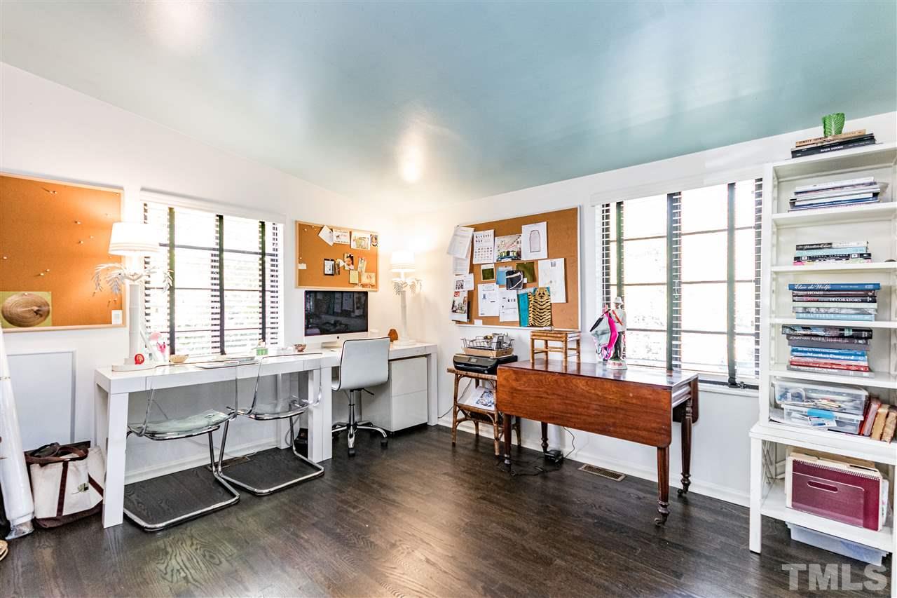 1114 Harvey Street Raleigh, NC 27608 - Photo 13 of 24 a reading room with furniture wooden floor and a window