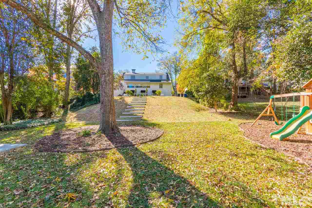 1114 Harvey Street Raleigh, NC 27608 - Photo 22 of 24 a view of a backyard with swimming pool