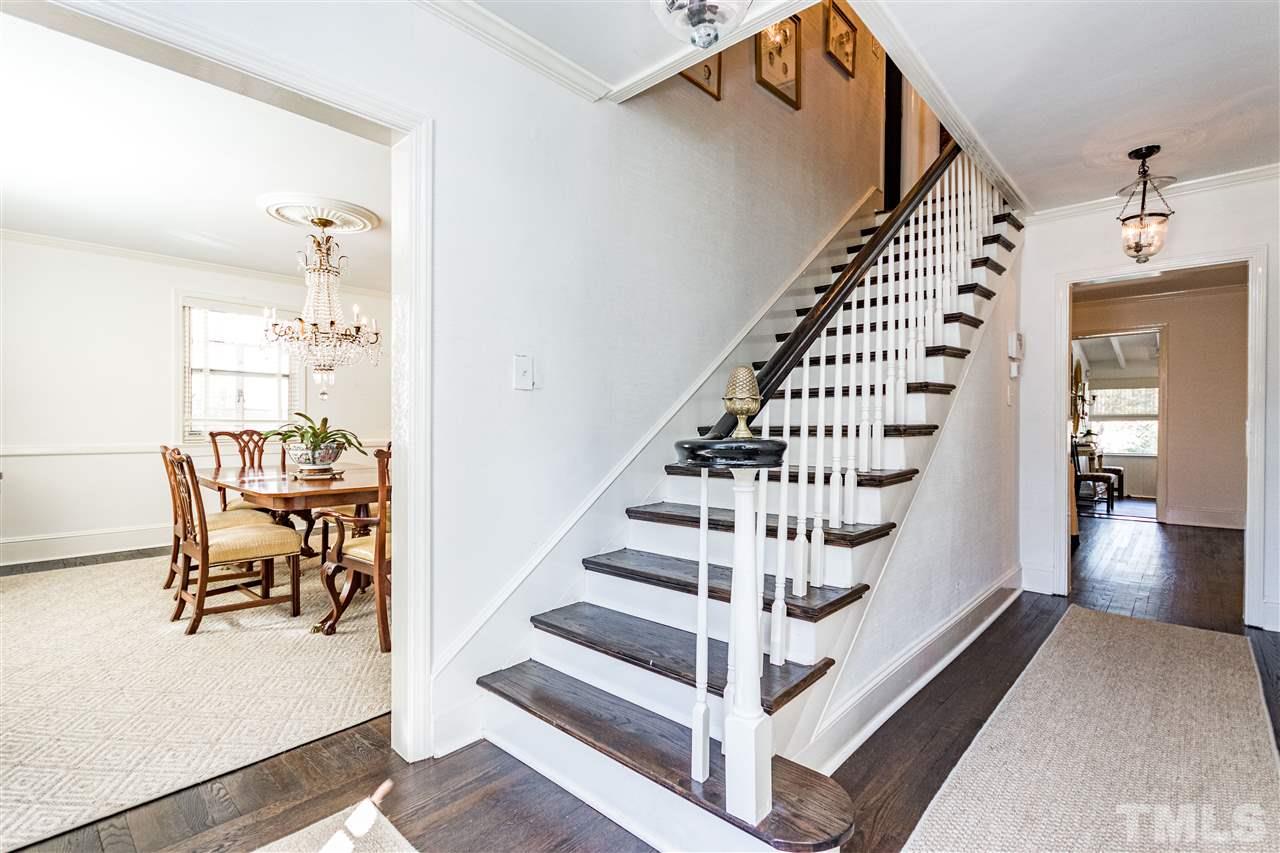 1114 Harvey Street Raleigh, NC 27608 - Photo 4 of 24 a view of entryway and hall with wooden floor