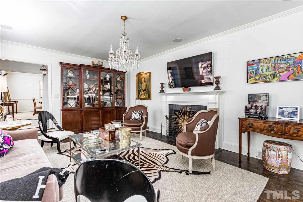 1114 Harvey Street Raleigh, NC 27608 - Photo 6 of 24 a view of a livingroom with furniture and a fireplace