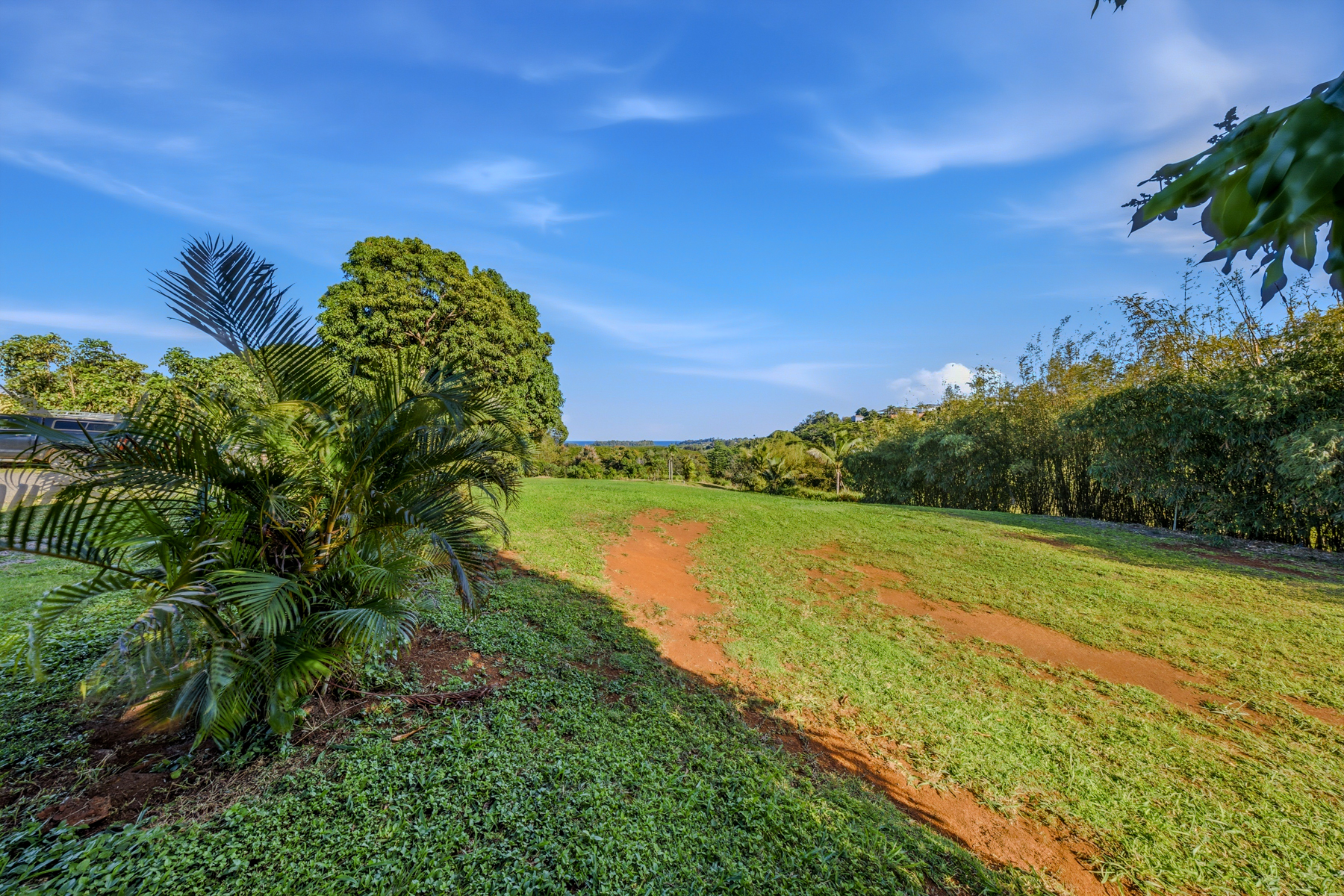 5409 Lot 2 Laipo Road, Unit 2 Kapaa, HI 96746 - Photo 13 of 24 a view of a lake with a yard