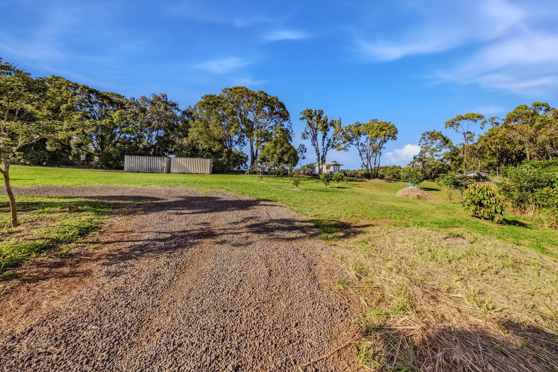 5409 Lot 2 Laipo Road, Unit 2 Kapaa, HI 96746 - Photo 4 of 24 a view of a field with a building in the background