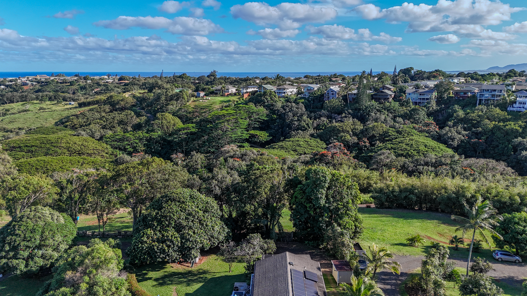 5409 Lot 2 Laipo Road, Unit 2 Kapaa, HI 96746 - Photo 10 of 24 an aerial view of a house with a yard