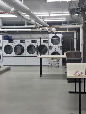a stove top oven sitting inside of a room