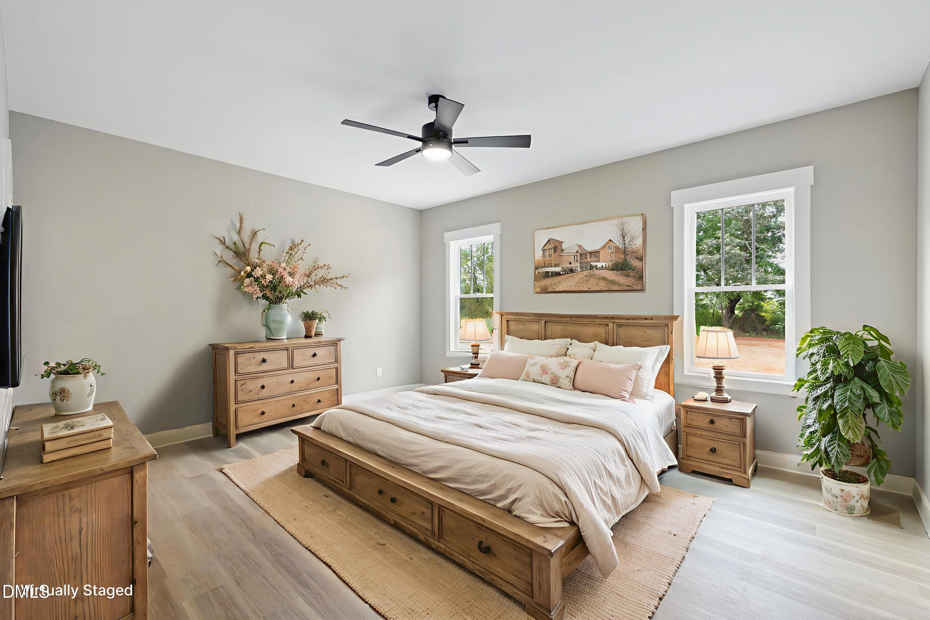 9293 Bear Run Lane Middlesex, NC 27557 - Photo 14 of 36 a bedroom with a bed and a chandelier