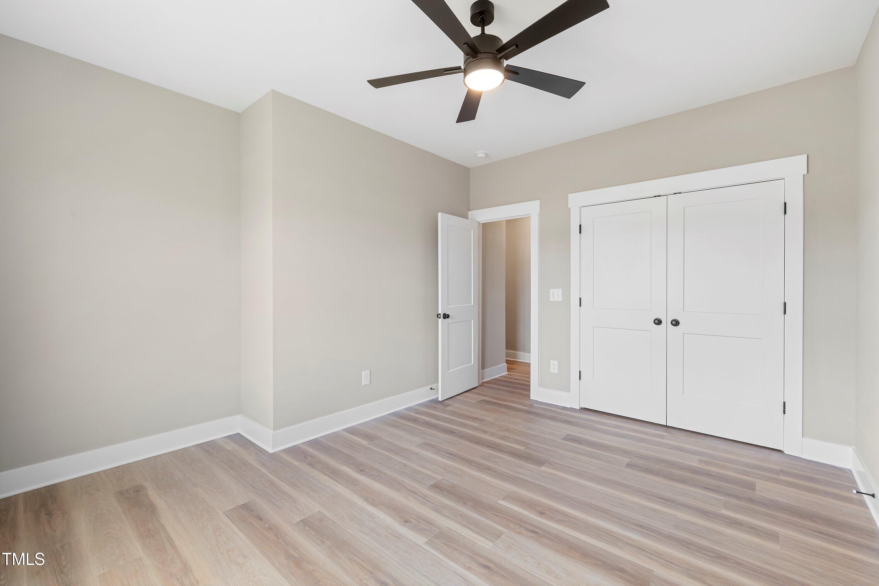 9293 Bear Run Lane Middlesex, NC 27557 - Photo 23 of 36 wooden floor in an empty room