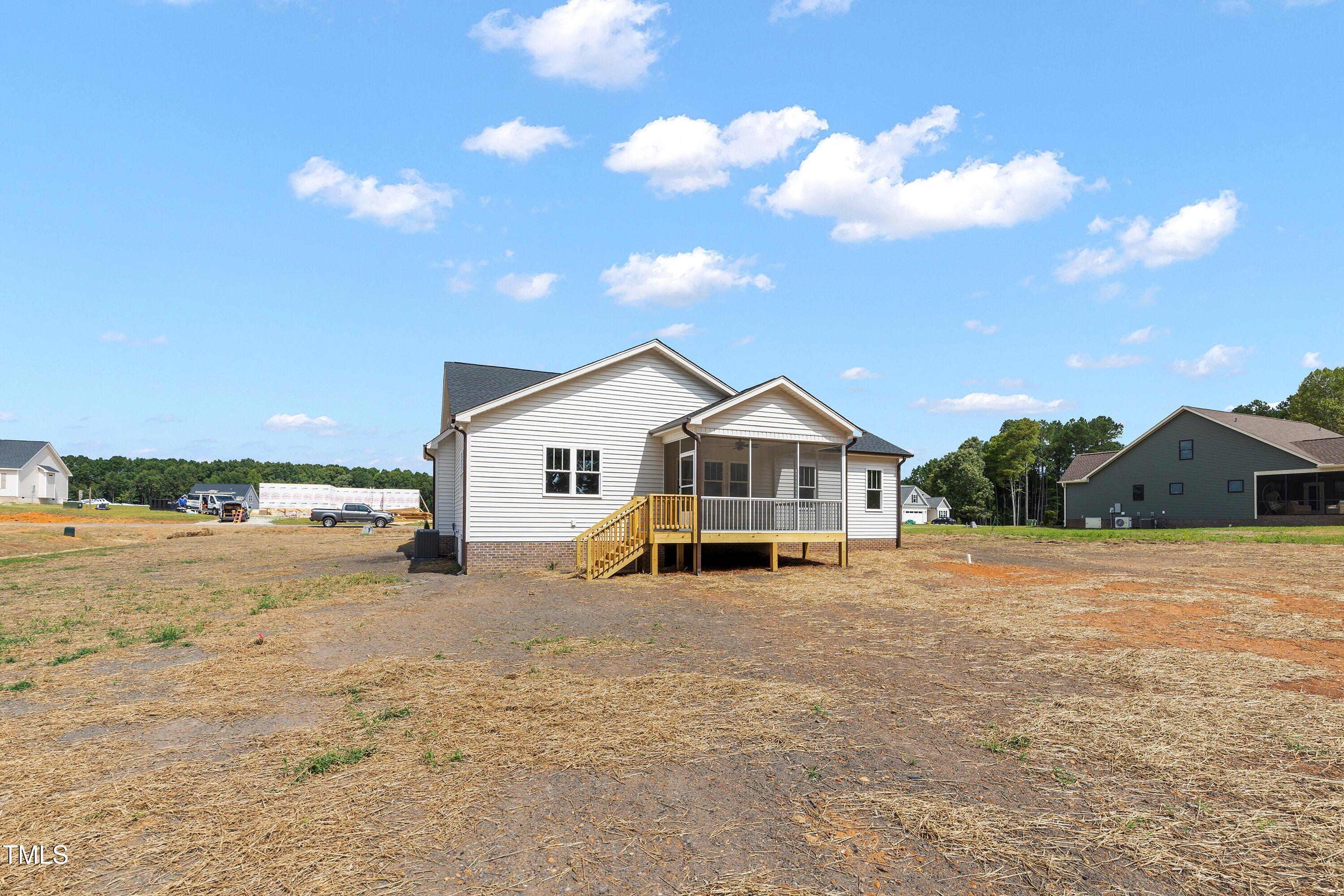9293 Bear Run Lane Middlesex, NC 27557 - Photo 31 of 36 a view of a house with a yard