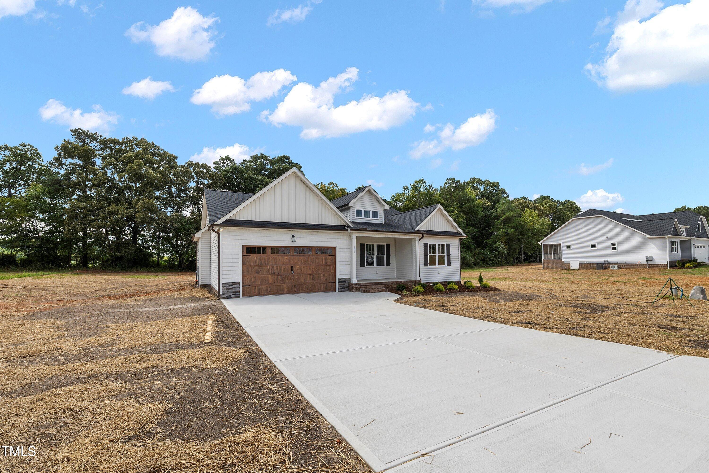 9293 Bear Run Lane Middlesex, NC 27557 - Photo 34 of 36 a view of a house with a outdoor space