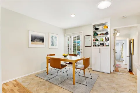 a workspace with furniture and window