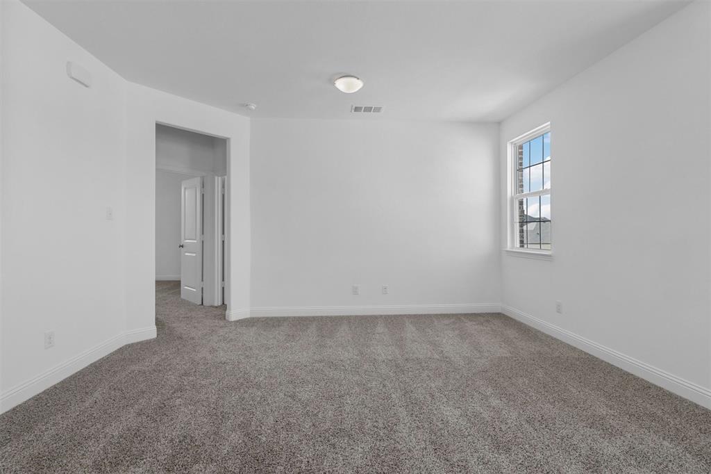 704 Amenduni Lane Anna, TX 75409 - Photo 11 of 19 a view of an empty room with a window