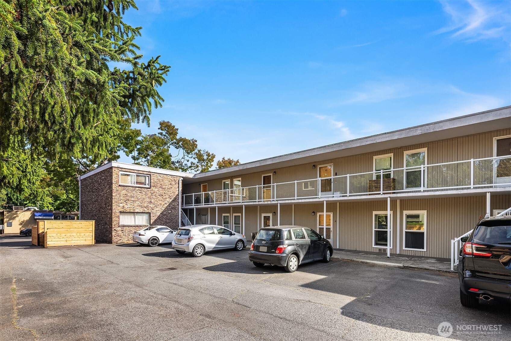 8701 35th Avenue Northeast, Unit 9 Seattle, WA 98115 - Photo 18 of 19 a view of a car in front of house