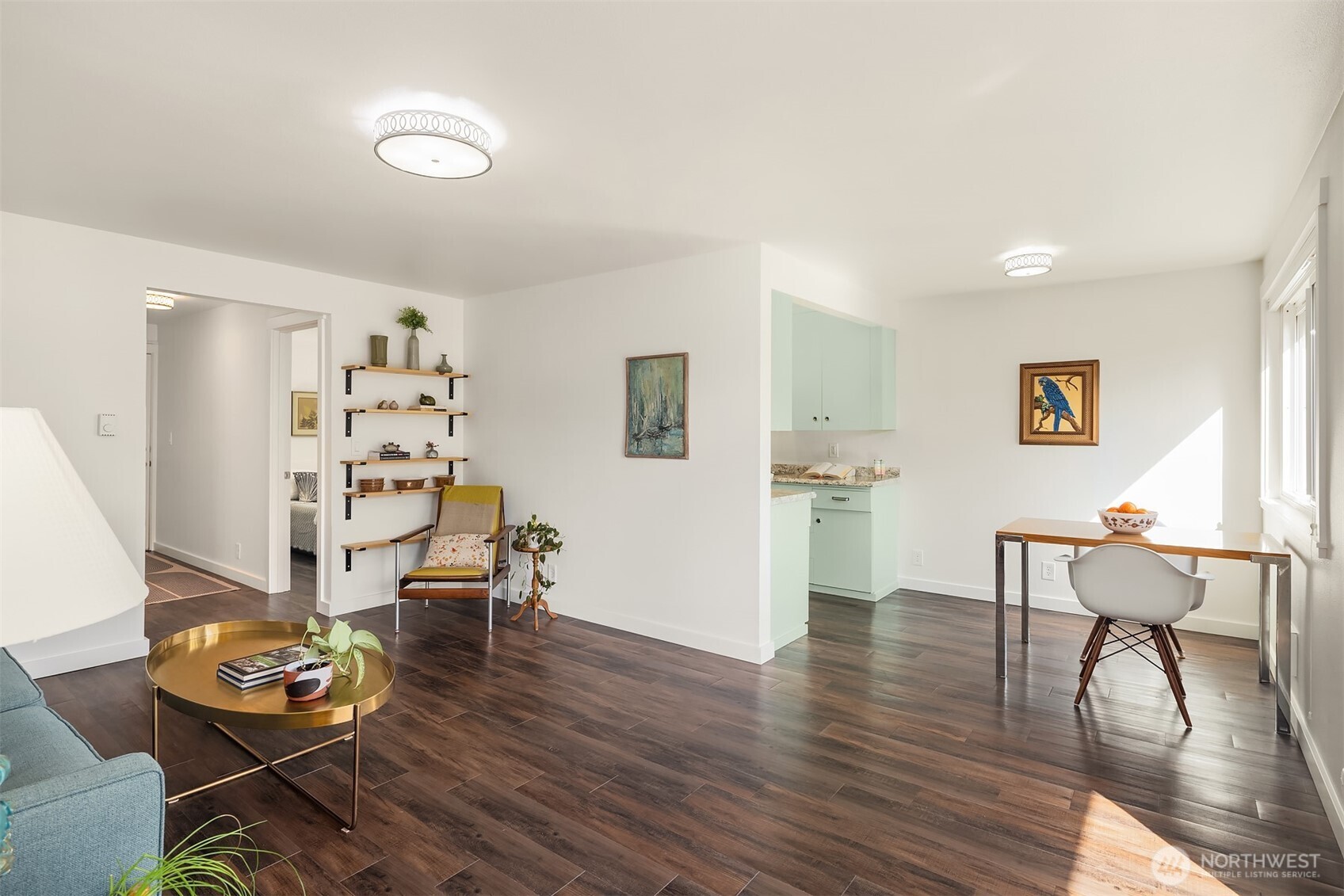 8701 35th Avenue Northeast, Unit 9 Seattle, WA 98115 - Photo 8 of 19 a living room with furniture and wooden floor