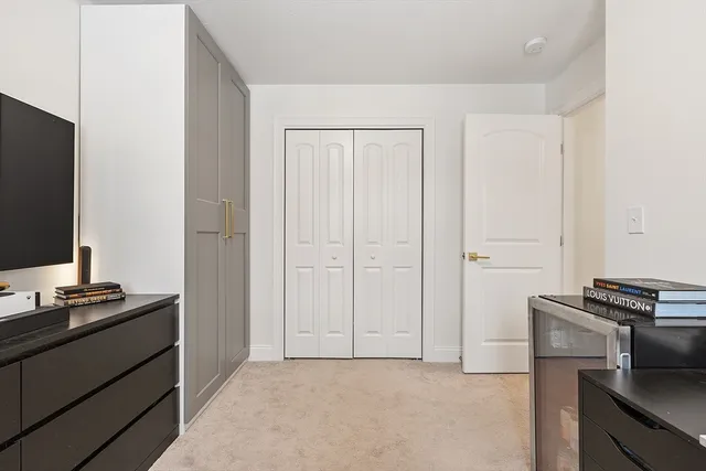 a view of a workspace with furniture