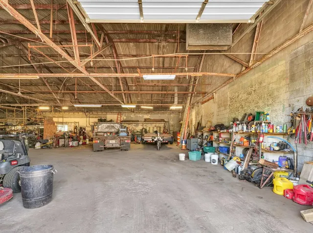 a view of a storage room with racks