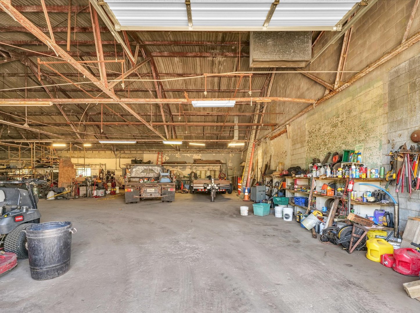 121 Neal Drive, Unit 1 Rantoul, IL 61866 - Photo 21 of 30 a view of a storage room with a lot of stuff