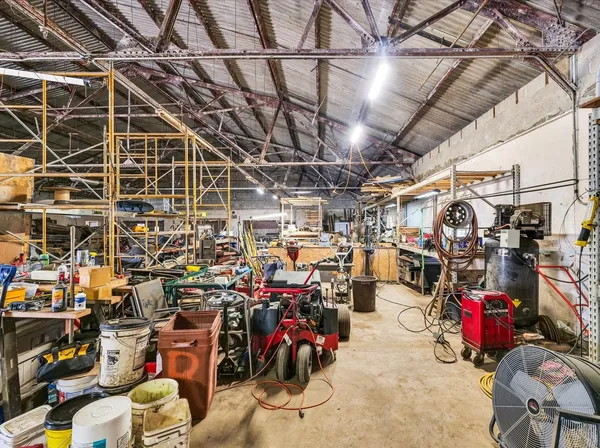 a view of parking garage with cars
