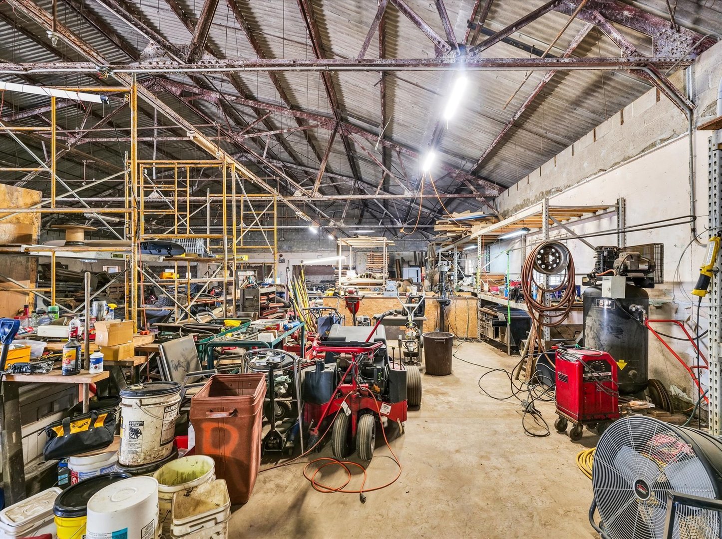 121 Neal Drive, Unit 1 Rantoul, IL 61866 - Photo 22 of 30 a view of a storage room with racks