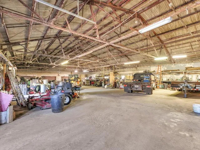 a view of a street with a yard