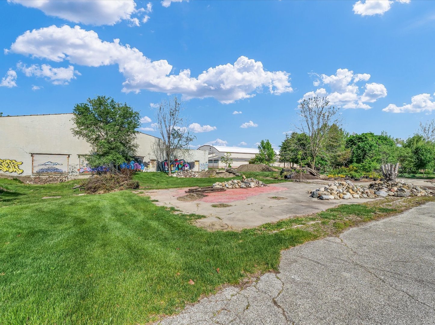 121 Neal Drive, Unit 1 Rantoul, IL 61866 - Photo 29 of 30 a view of a yard with cars