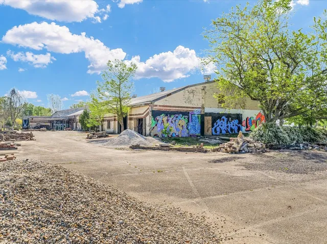 a front view of a house with street