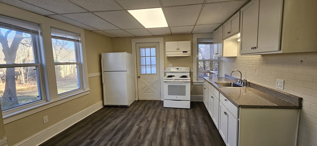 378 Boston Road Monson, MA 01069 - Photo 14 of 22 a kitchen that has a sink stainless steel appliances a counter space and a window