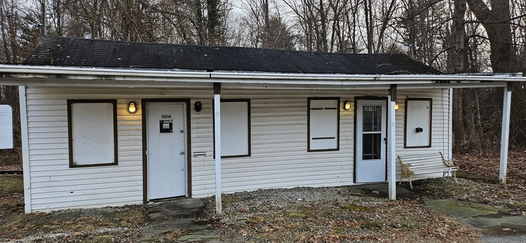 378 Boston Road Monson, MA 01069 - Photo 3 of 22 a view of a house with a door and wooden fence