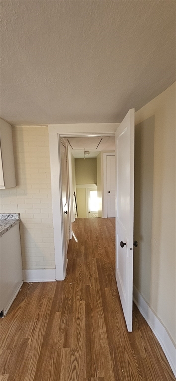 378 Boston Road Monson, MA 01069 - Photo 8 of 22 a view of a room with wooden floor and a bathroom