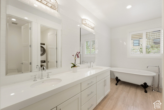 369 East Overlook Loop Kamas, UT 84036 - Photo 36 of 64 Dual sink vanity with white countertop, white cabinetry, and polished chrome fixtures