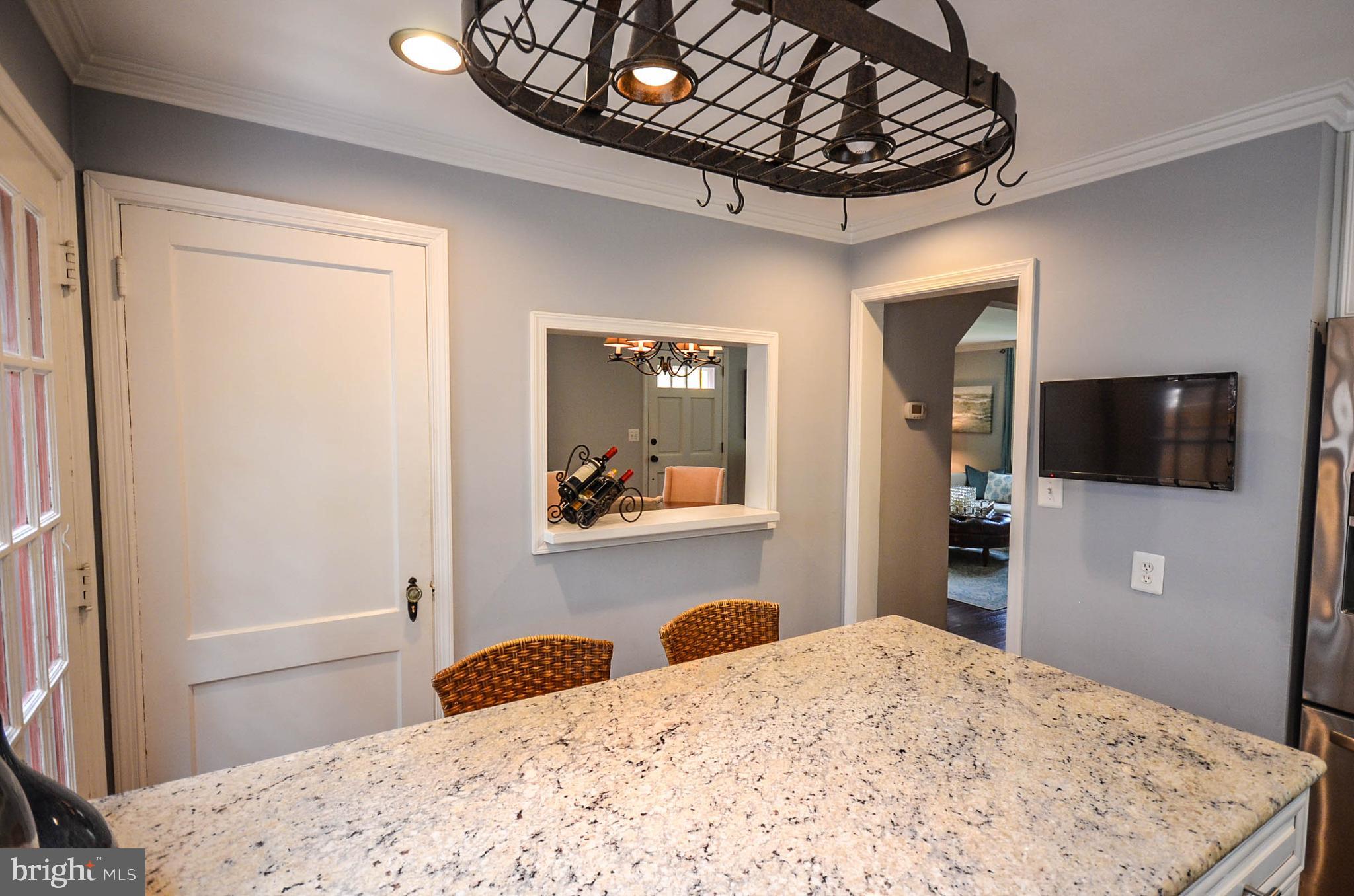 9912 Capitol View Avenue Silver Spring, MD 20910 - Photo 8 of 35 Recessed & pendant lighting, new door to patio