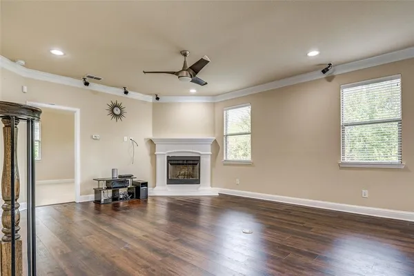 a view of a livingroom with furniture and a fireplace