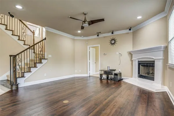 a view of a livingroom with furniture and a fireplace