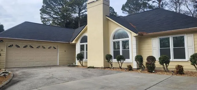 a view of house with outdoor space