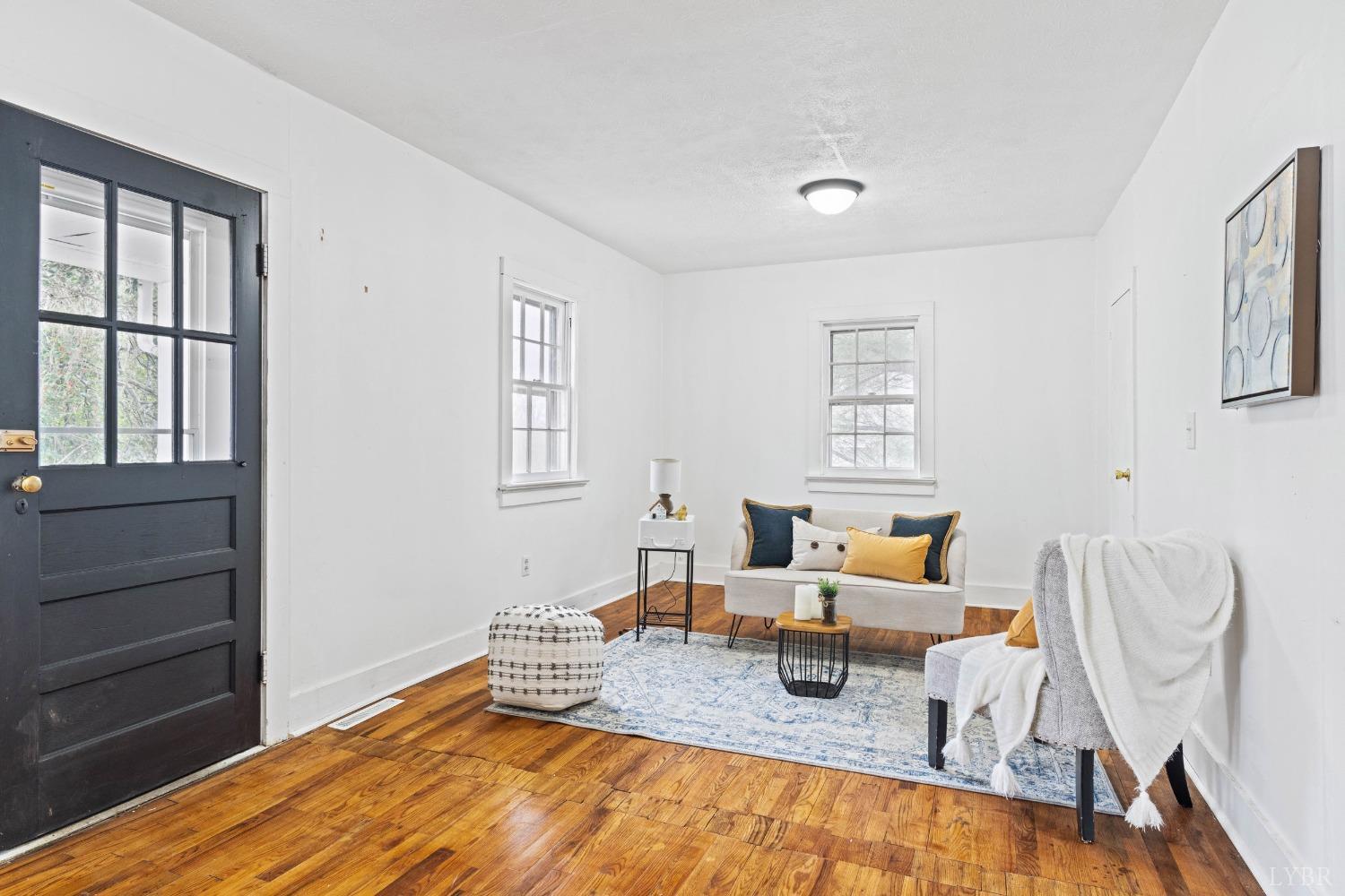 178 Ralph Street Pamplin, VA 23958 - Photo 5 of 41 a living room with furniture and a window