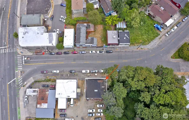 an aerial view of residential houses and outdoor space
