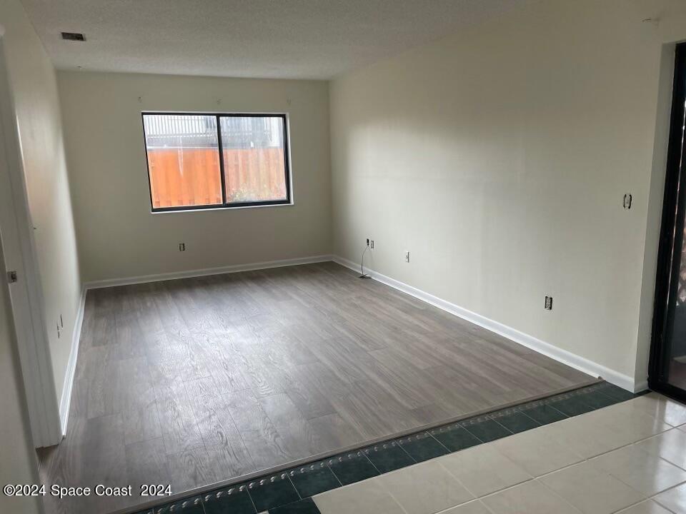 3250 Beach View Way Melbourne Beach, FL 32951 - Photo 4 of 7 an empty room with windows