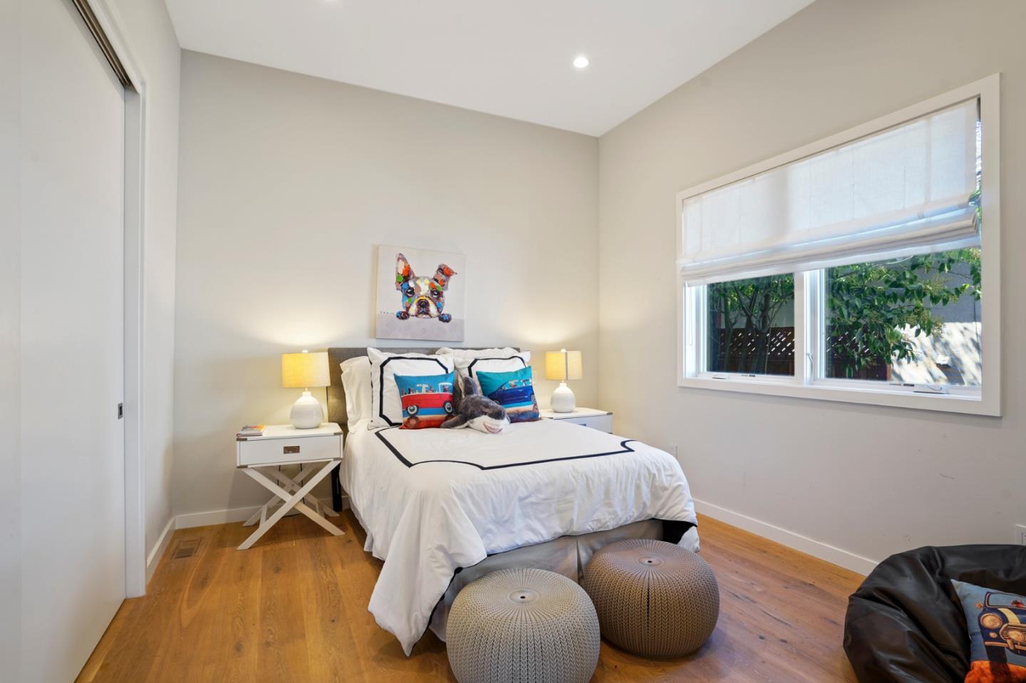 313 Oakview Drive San Carlos, CA 94070 - Photo 28 of 47 a bedroom with a bed and a window