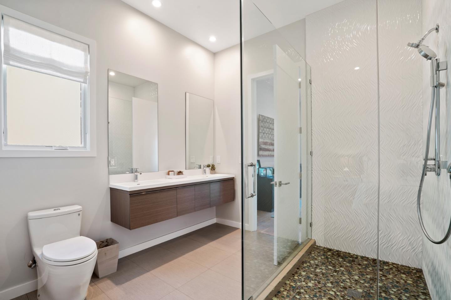 313 Oakview Drive San Carlos, CA 94070 - Photo 32 of 47 a bathroom with a sink a toilet and shower