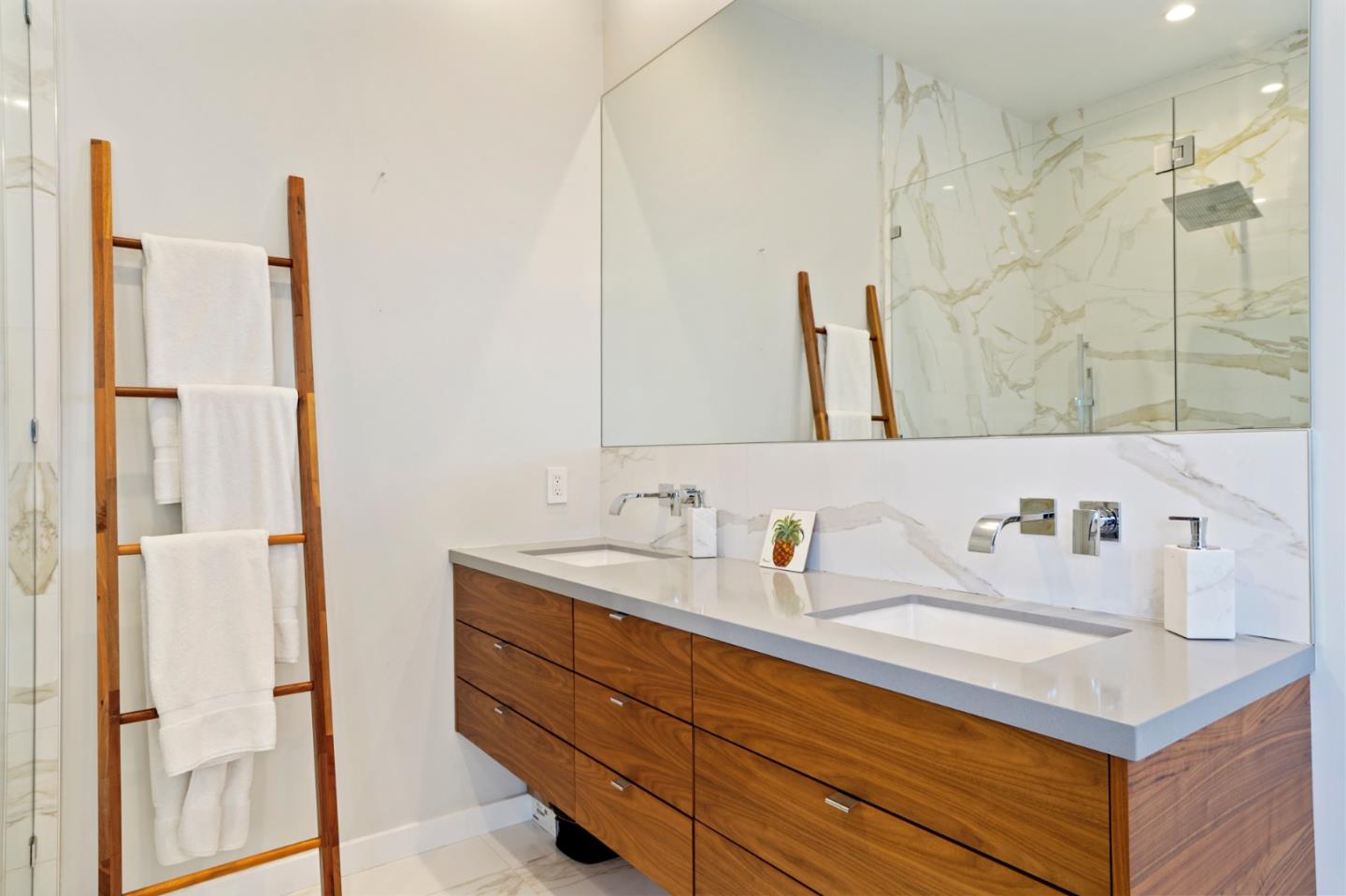 313 Oakview Drive San Carlos, CA 94070 - Photo 43 of 47 a bathroom with a sink and a mirror