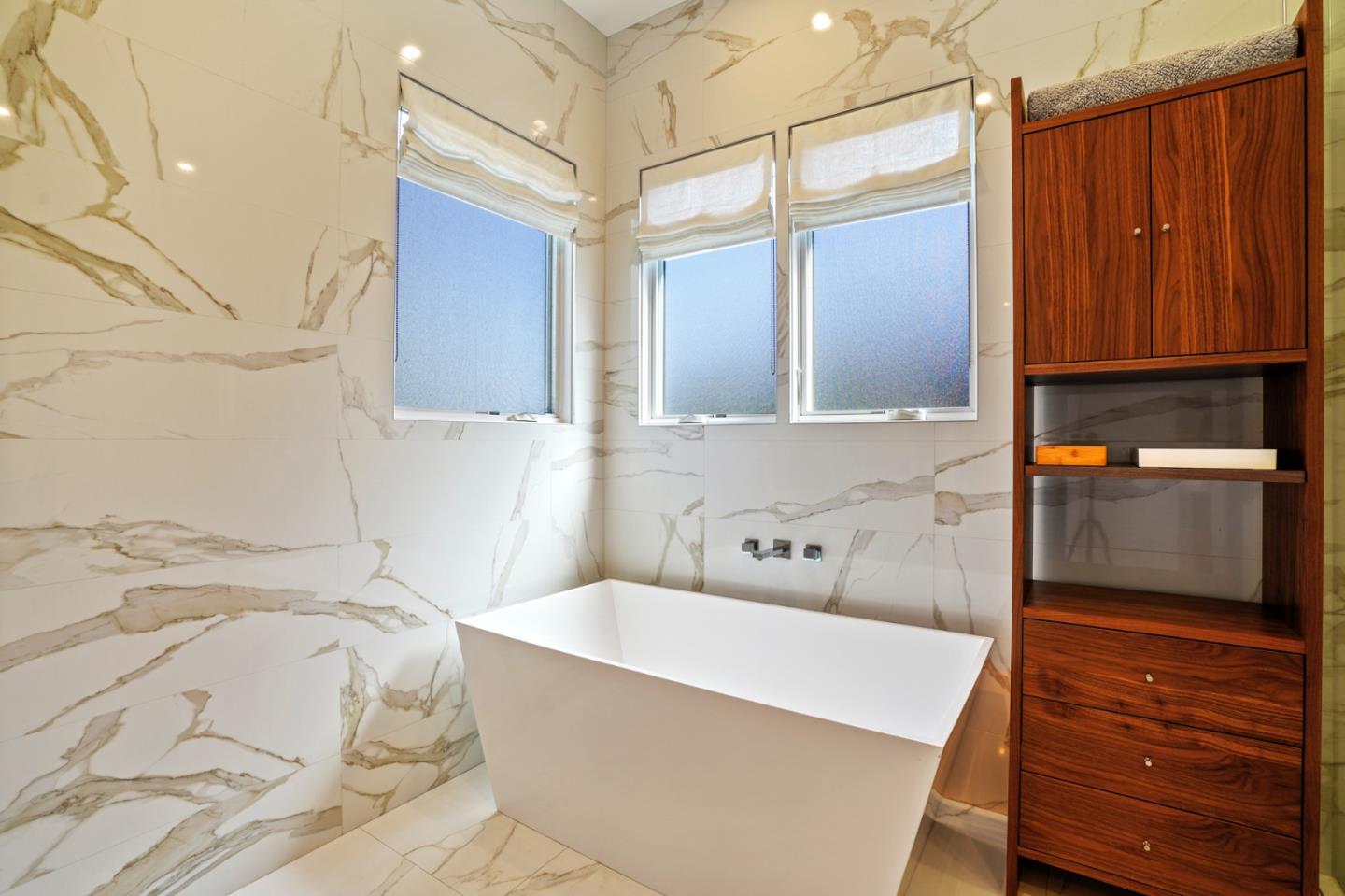 313 Oakview Drive San Carlos, CA 94070 - Photo 44 of 47 a bathroom with a tub a sink and a shower