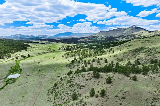 a view of lake with mountain