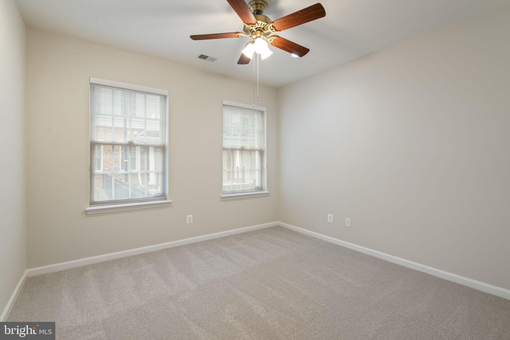 20751 Royal Palace Square, Unit 104 Sterling, VA 20165 - Photo 31 of 44 a view of an empty room with a window