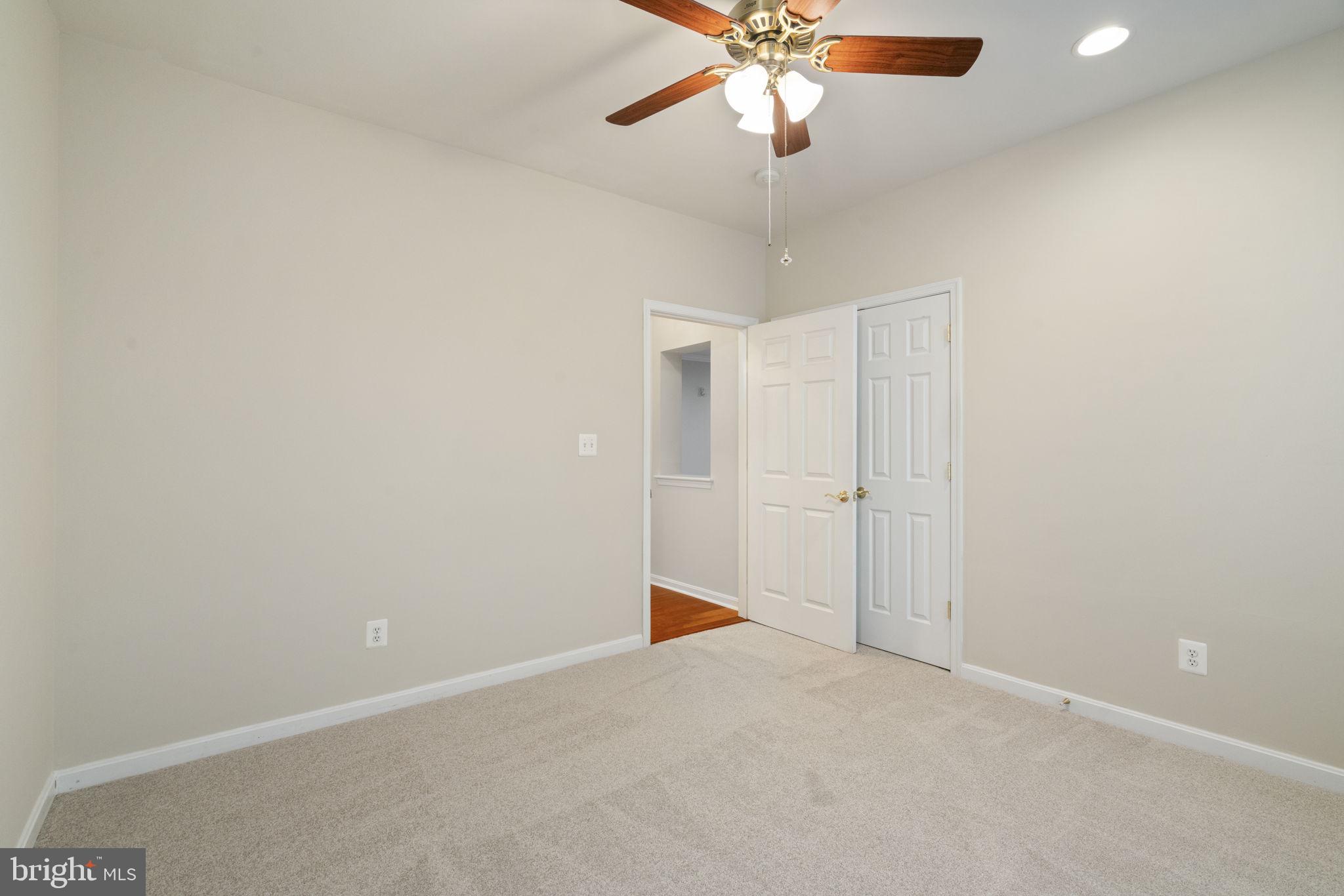 20751 Royal Palace Square, Unit 104 Sterling, VA 20165 - Photo 32 of 44 wooden floor in an empty room