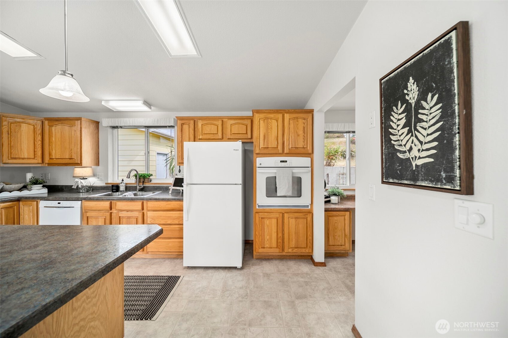 756 Totem Pole Road Manson, WA 98831 - Photo 14 of 39 a kitchen with refrigerator and window