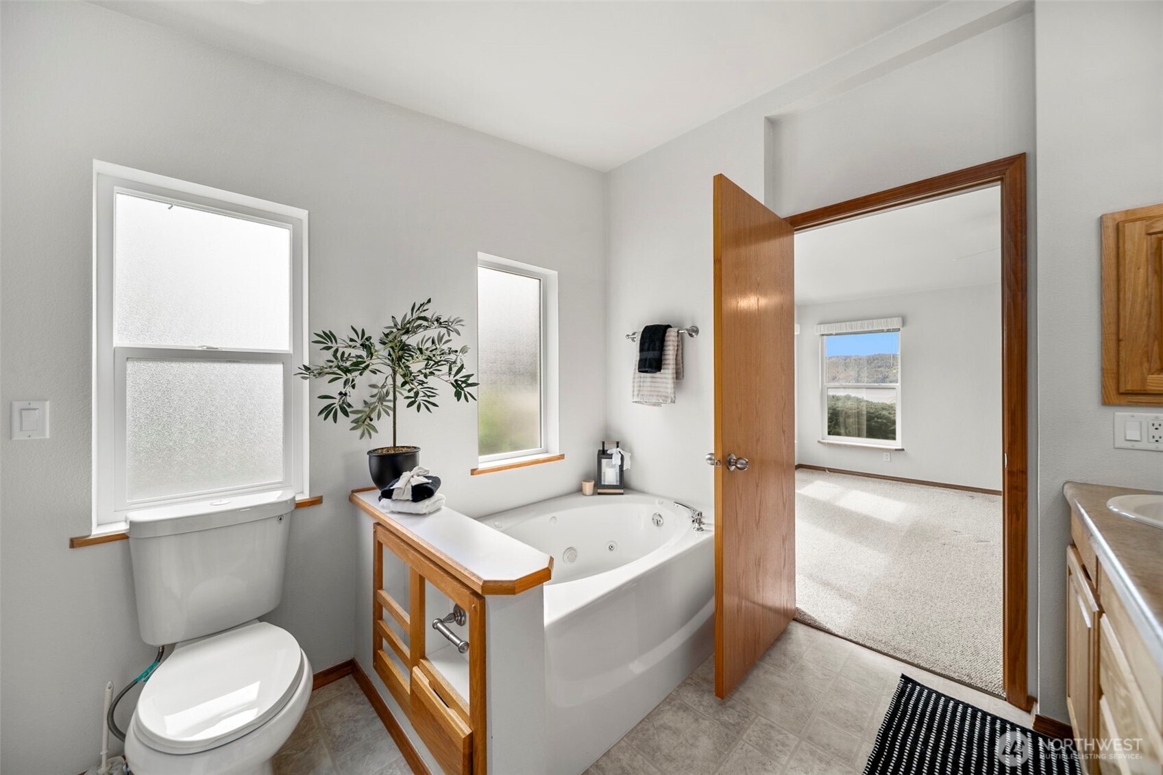 756 Totem Pole Road Manson, WA 98831 - Photo 20 of 39 a bathroom with a sink a toilet and shower