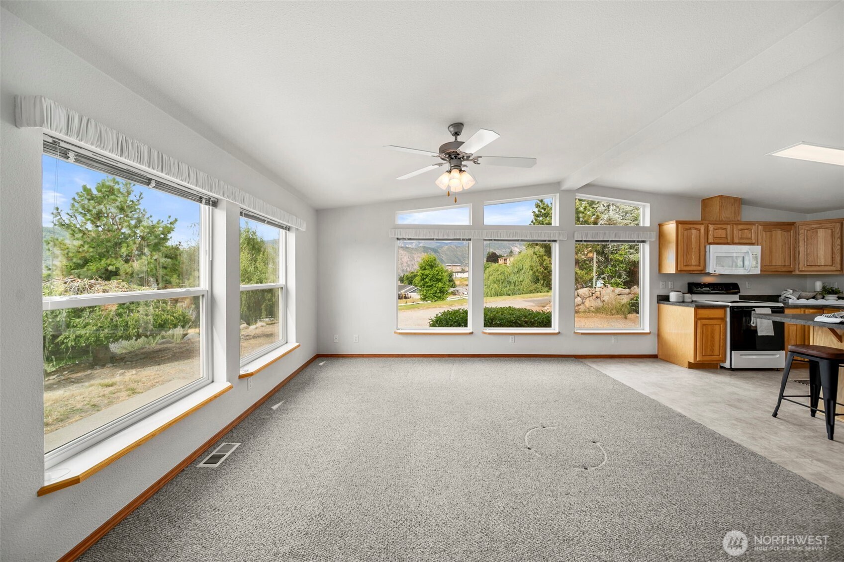 756 Totem Pole Road Manson, WA 98831 - Photo 24 of 39 wooden floor in an empty room with a window