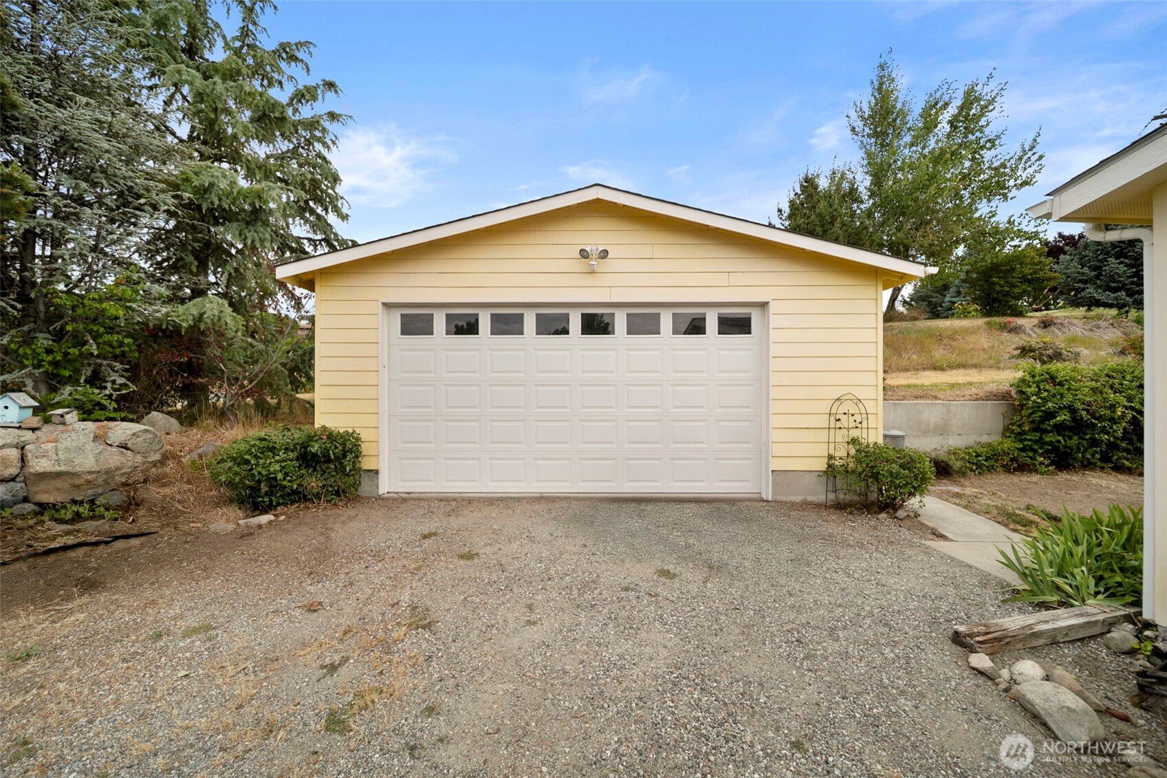 756 Totem Pole Road Manson, WA 98831 - Photo 27 of 39 a view of a house with a yard