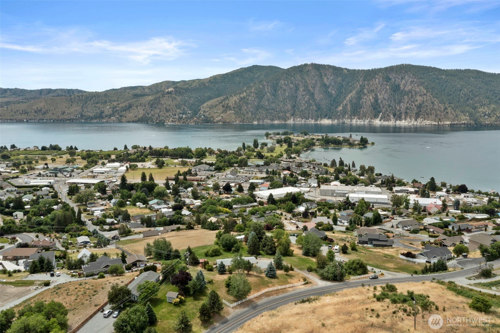 756 Totem Pole Road Manson, WA 98831 - Photo 3 of 39 a view of lake with mountain