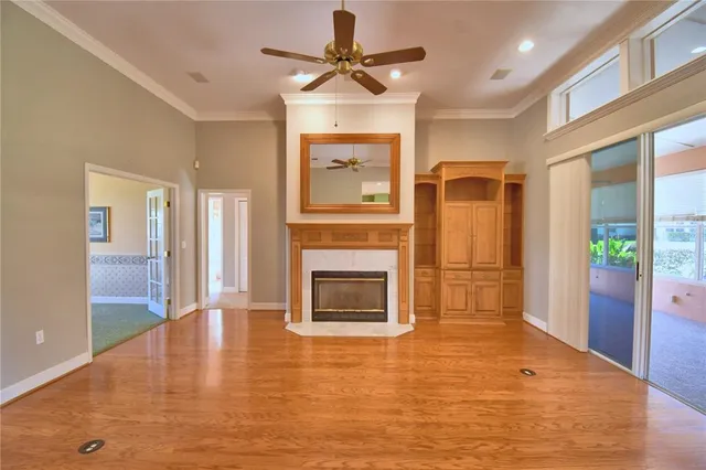 a kitchen with stainless steel appliances a stove a refrigerator and cabinets