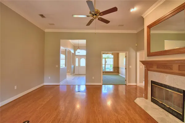 a kitchen with cabinets and window