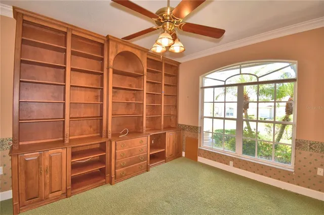 a view of a bathroom with a sink and a mirror